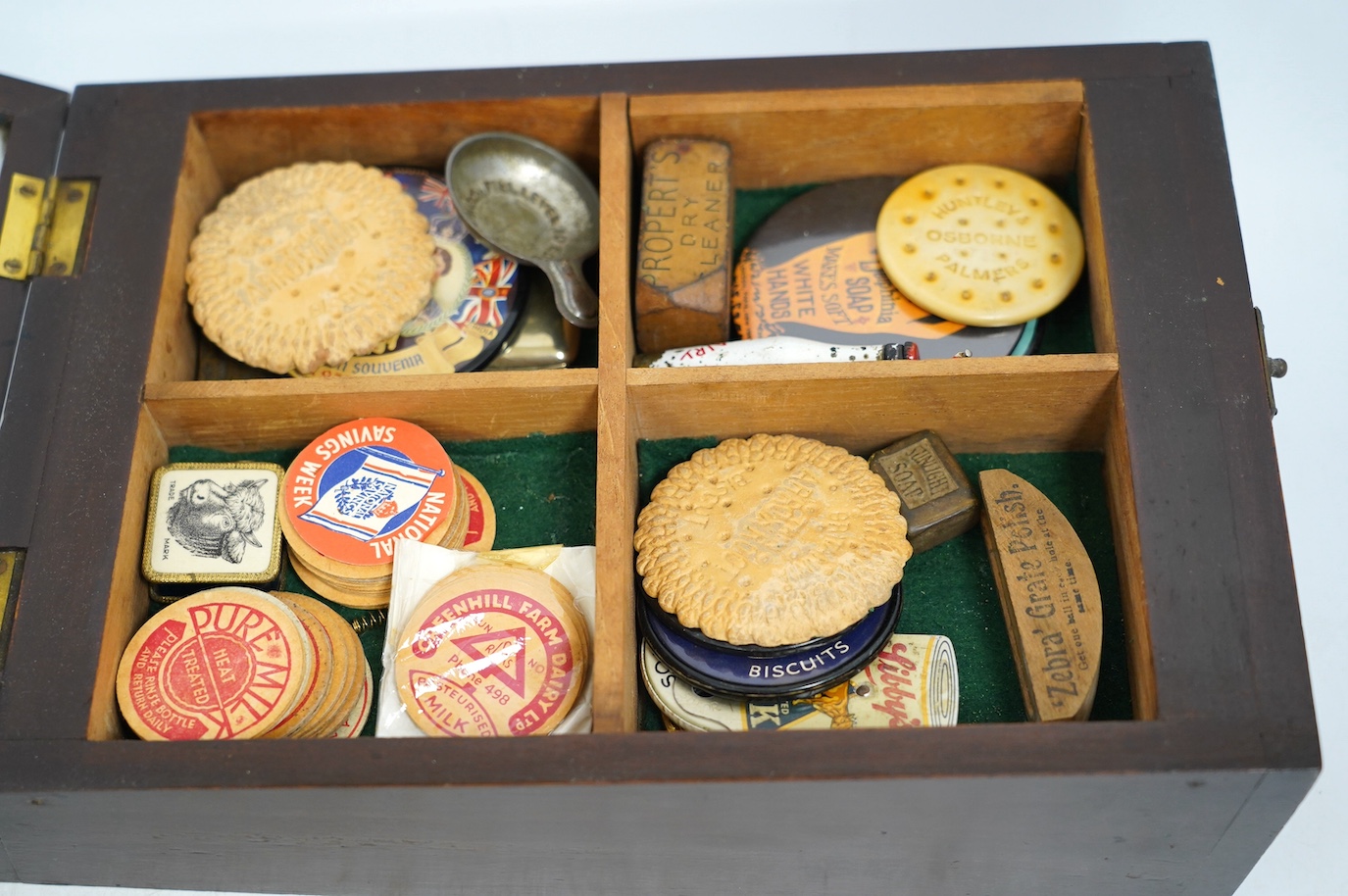 An early 20th century Andrews Liver Salt circular advertising mirror, 20cm diameter, together with a collection of novelty pocket mirrors, milk caps, etc. Condition - fair to good
